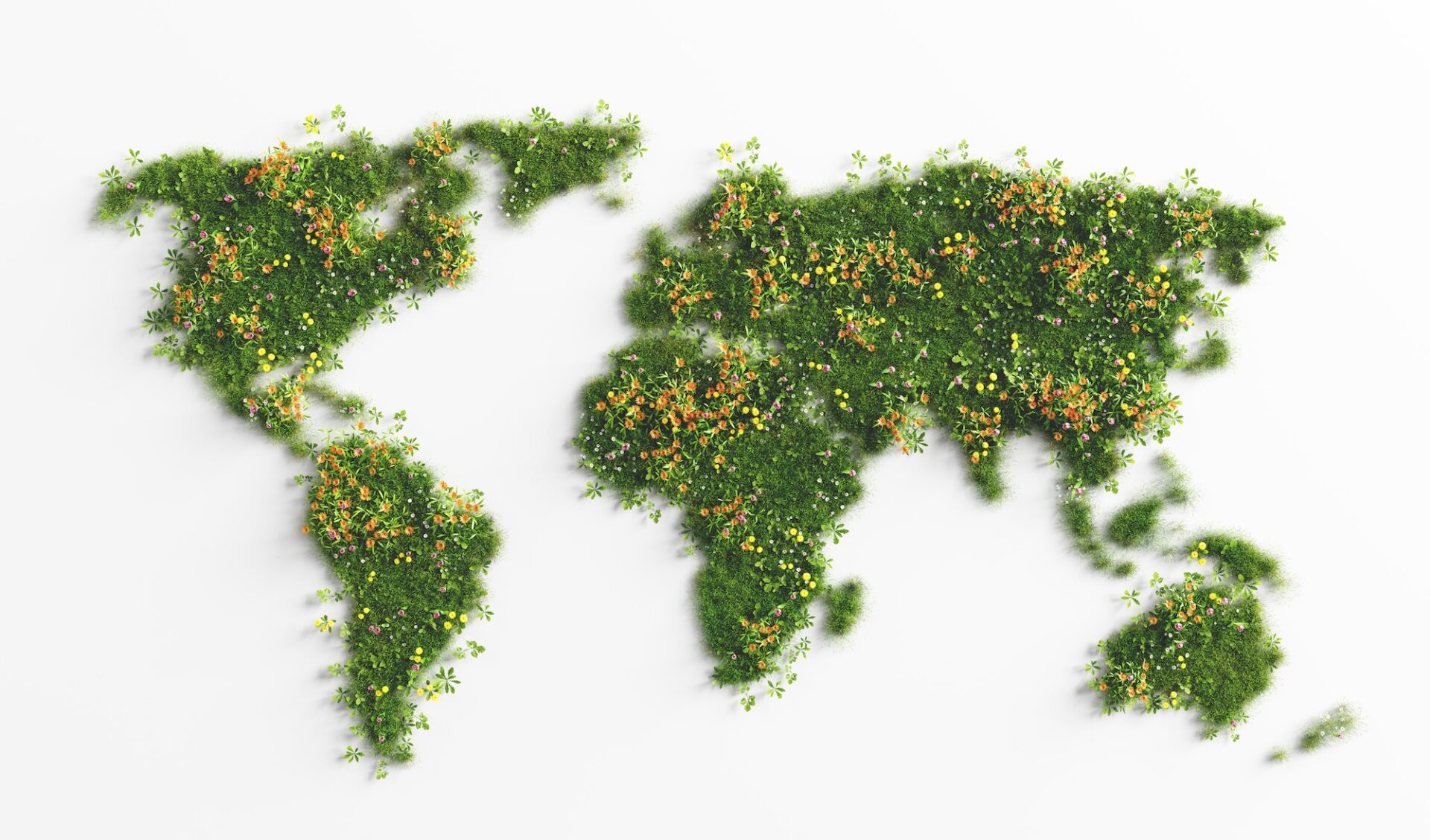 World map made of grass and spring summer flowers